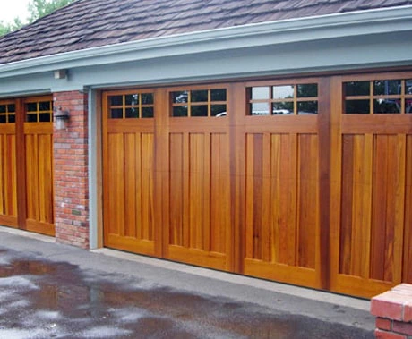Wood-toned replacement garage door from the company gallery