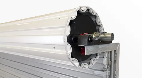 Coiling roll-up door curtain and barrel assembly
