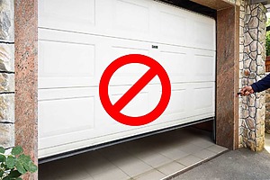 Garage Door Not Closing? Here's Why (and How to Fix It)
