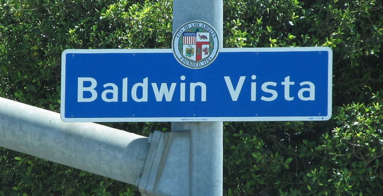 Baldwin Vista neighborhood sign at La Brea and Coliseum Street.