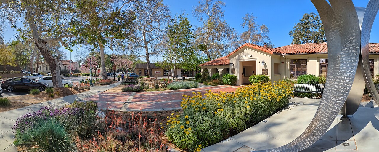Claremont City Hall and landscaped plaza in a wide panoramic view.