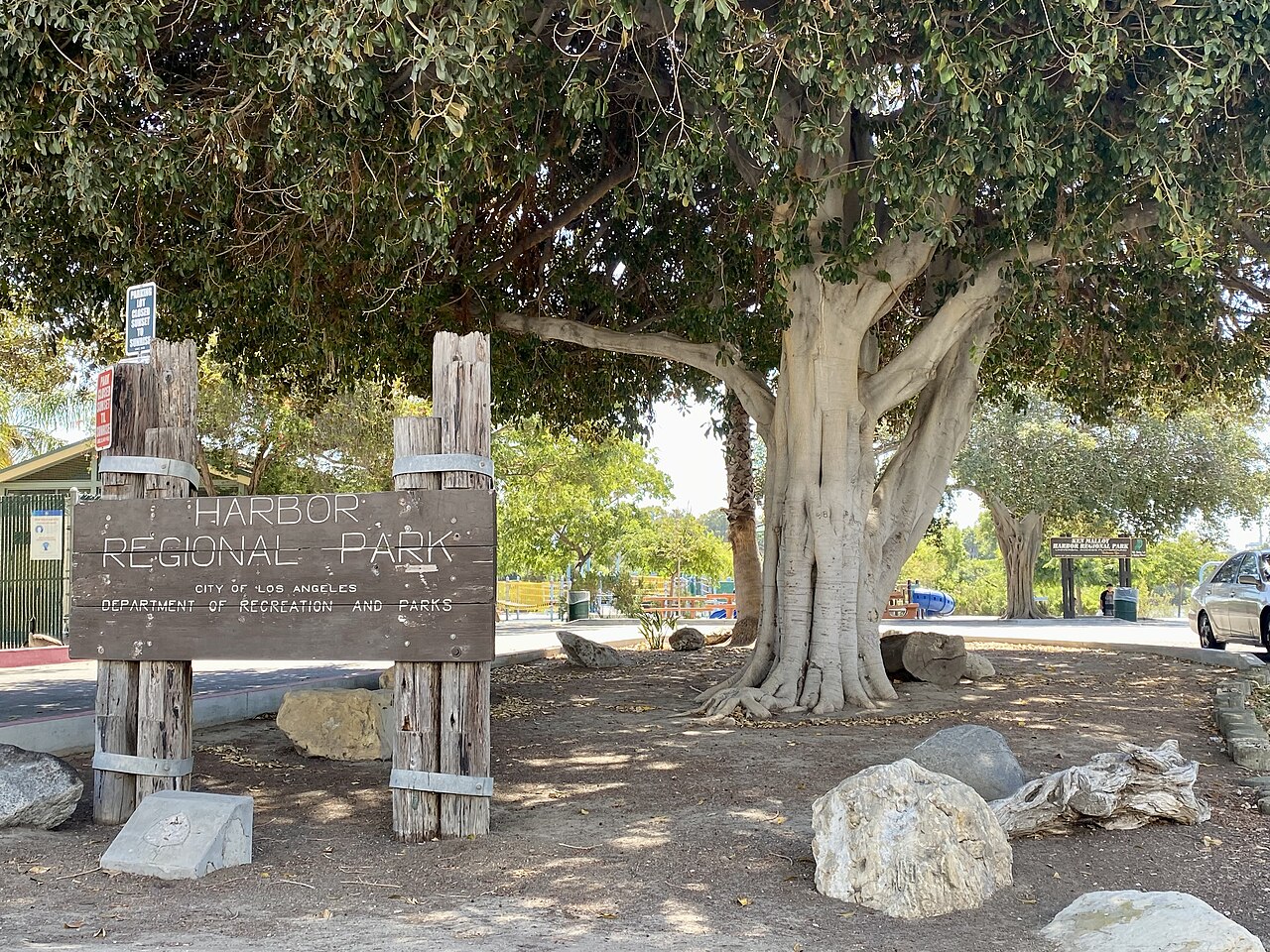 Ken Malloy Harbor Regional Park entrance and shade trees in Harbor City.