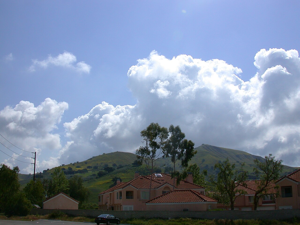 Steeplechase condominiums and green hills near Lost Hills Road and Malibu Hills Road in Calabasas.