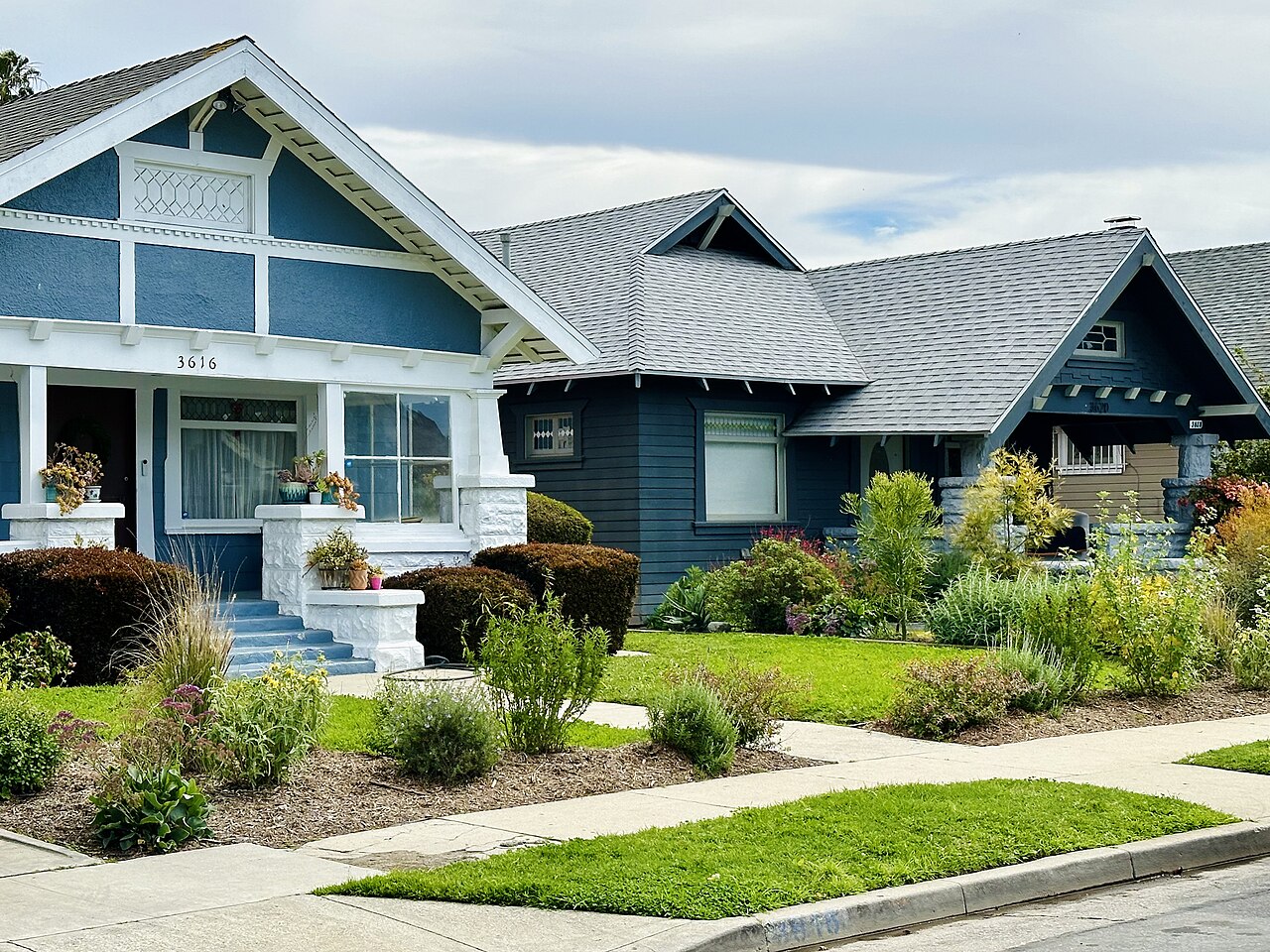 Bungalow homes with covered porches and landscaped front gardens.