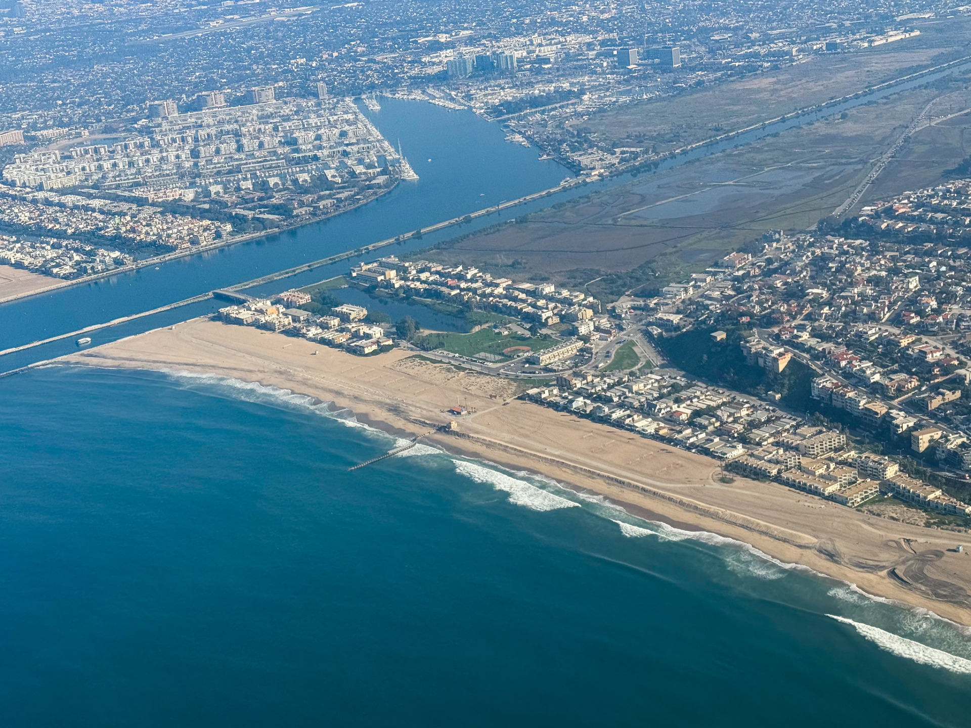 Aerial view of Playa del Rey beach and Ballona Creek meeting the Pacific